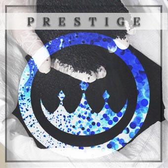 technician with black seeds in hands - prestige provisions