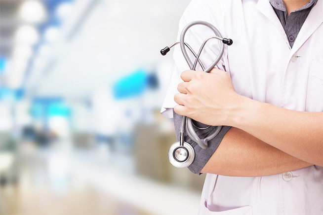 doctor with stethoscope in hand