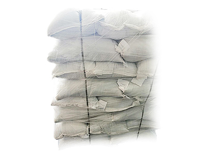 black seeds wholesale in polypropylene bales stacked up in piles - prestige provisions