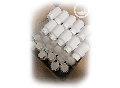 numerous white label black seed oil capsule containers in a box - prestige provisions