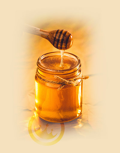 honey dripping into honey jar - yemeni sidr honey wholesale - prestige provisions