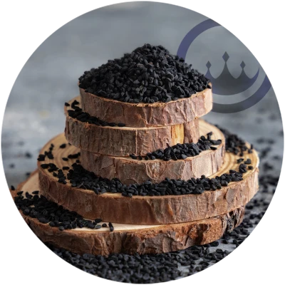 black cumin nigella sativa aka kalonj on stacks of circular wood with prestige provisions company logo