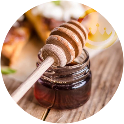 honey on wood table with prestige provisions uk wholesale logo